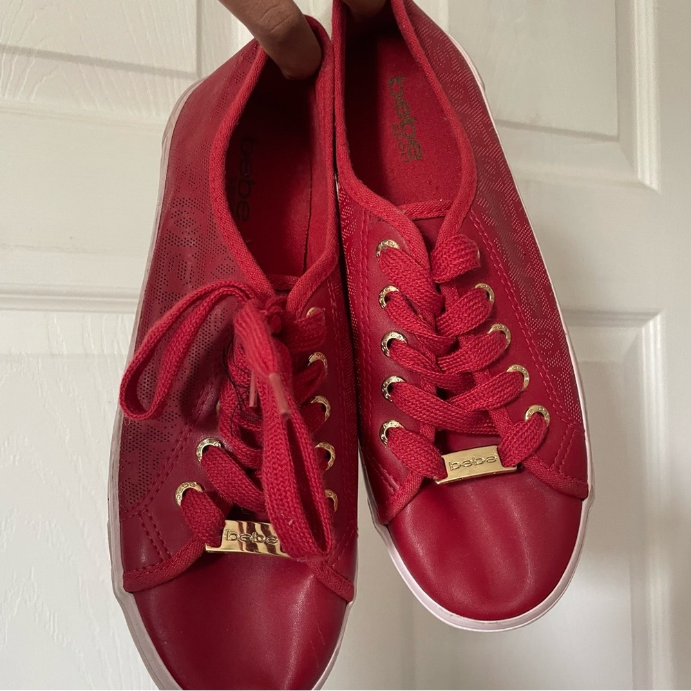 bebe Red Low-Top Lace-Up Sneakers with Gold Accents